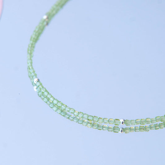 APRIL שרשרת אבני פרידוט