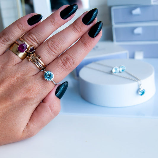 טבעת "טיילר" עם בלו טופז