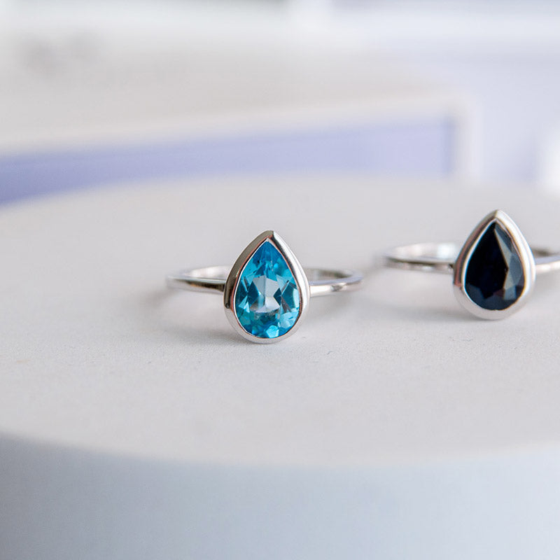 טבעת כסף טהור "טיפה" עם אבן טופז