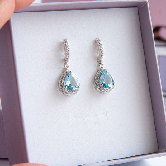 DIANA עגילי כסף עם אבני בלו טופז