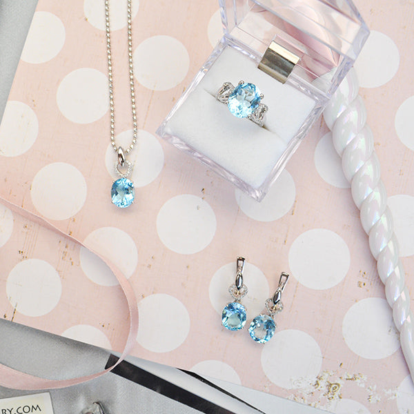 טבעת מכסף טהור "מישל" עם אבן בלו טופז