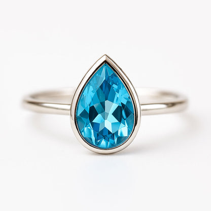 טבעת כסף טהור "טיפה" עם אבן טופז