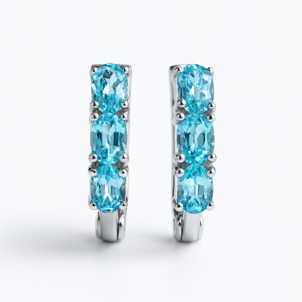 עגילי כסף "אוליב" עם אבני בלו טופז