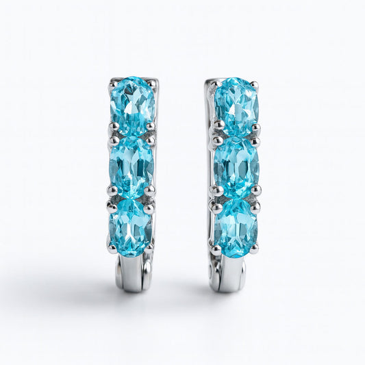 עגילי כסף "אוליב" עם אבני בלו טופז