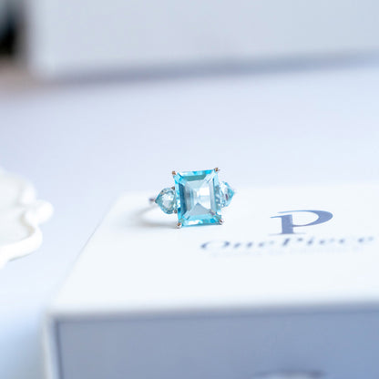 טבעת כסף "אליס" עם אבני בלו טופז