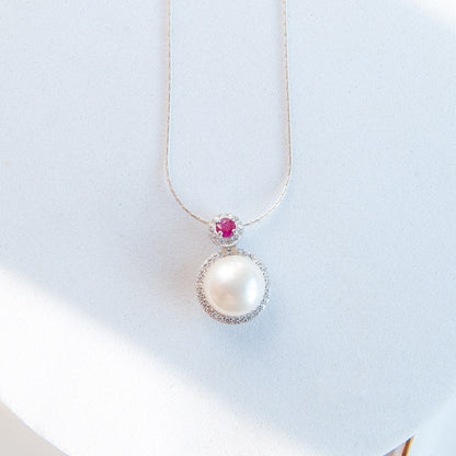 תליון כסף "לירי" עם פנינה ואבן רובי