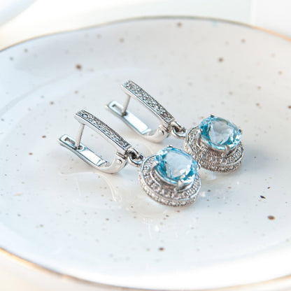 RUTH עגיל כסף עם אבני בלו טופז