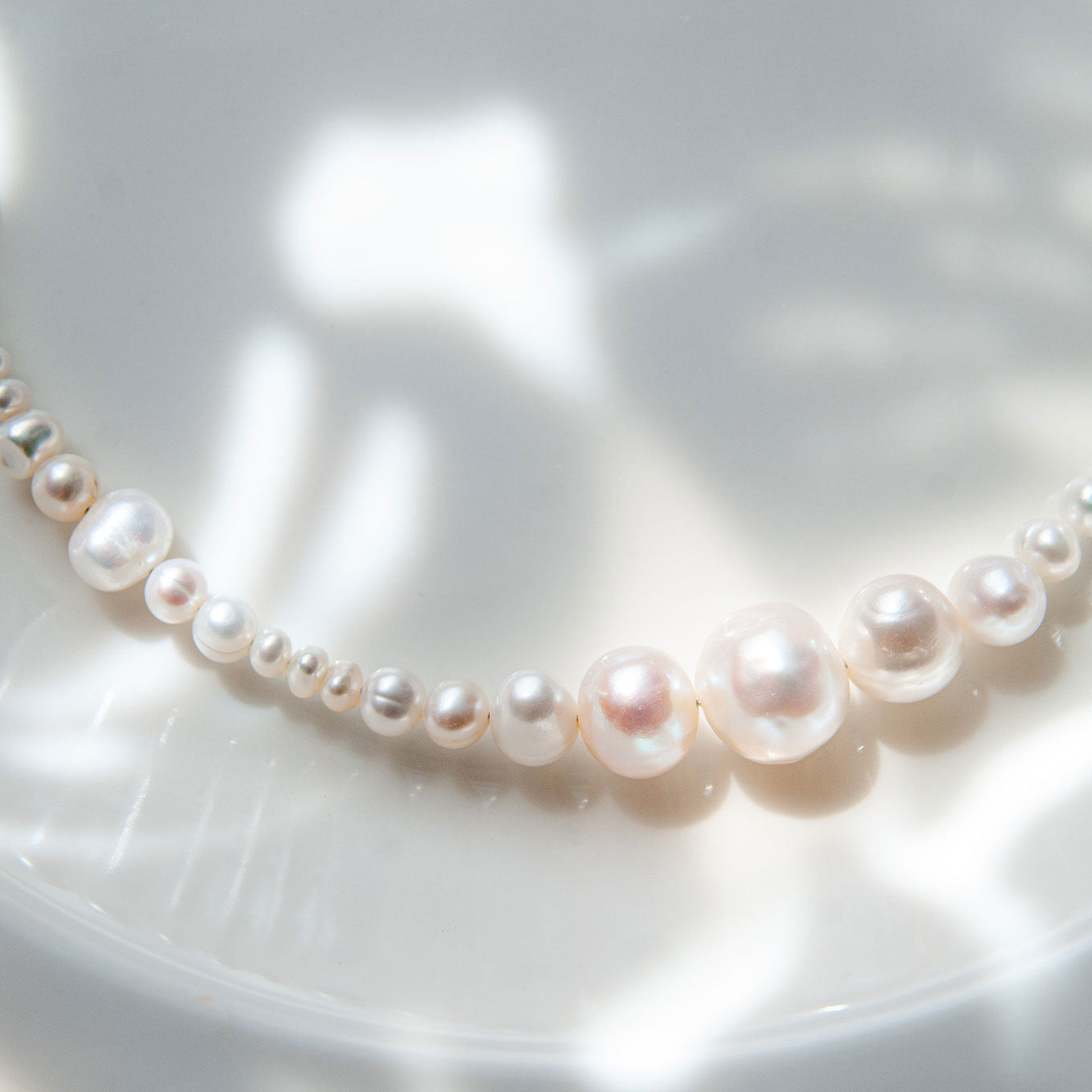 MORAN שרשרת פנינים בשילוב כמה גדלים