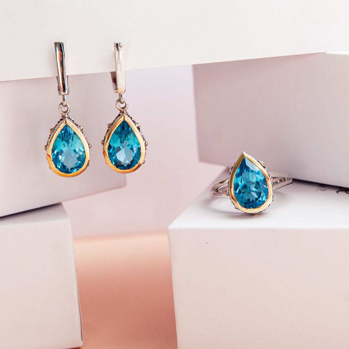 עגיל כסף "שיה" עם אבני בלו טופז