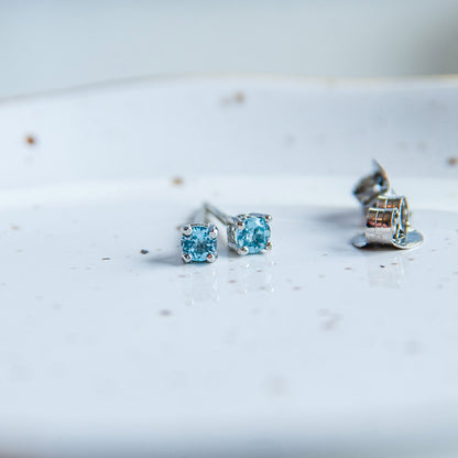 עגילי כסף קים עם בלו טופז