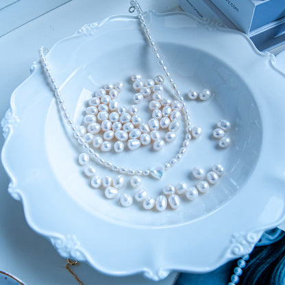 L שרשרת פנינים לבנות