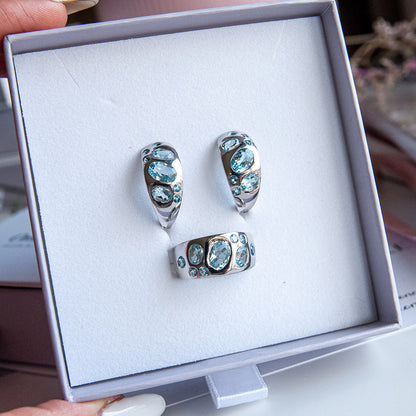 טבעת כסף טהור "שרלוט" עם אבני בלו טופז