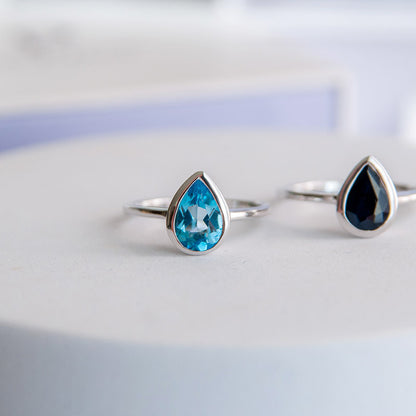 טבעת כסף טהור "טיפה" עם אבן טופז