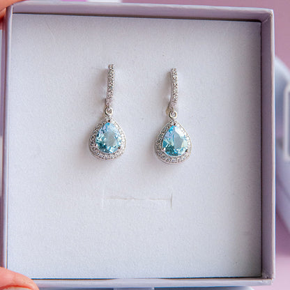 DIANA עגילי כסף עם אבני בלו טופז