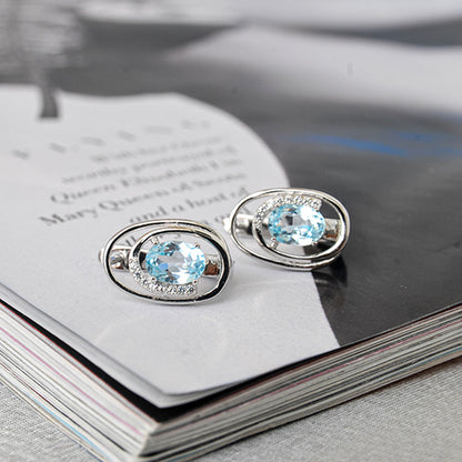 עגילי כסף "גרייס" עם אבני בלו טופז