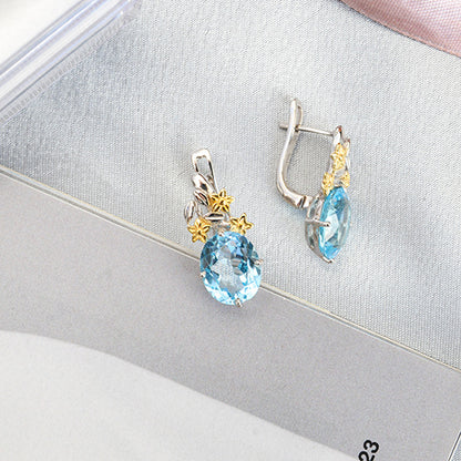 עגילי "סנדרה" עם בלו טופז טבעית