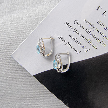 עגילי כסף "גרייס" עם אבני בלו טופז