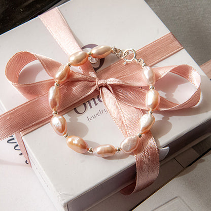 צמיד פנינים טיילור ורוד