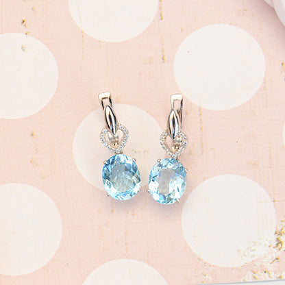 עגילי כסף "מישל" עם אבני בלו טופז