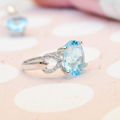 טבעת מכסף טהור "מישל" עם אבן בלו טופז