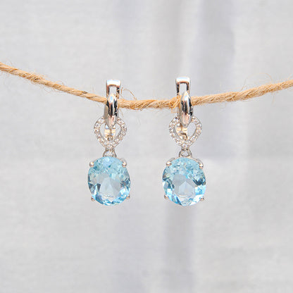 עגילי כסף "מישל" עם אבני בלו טופז